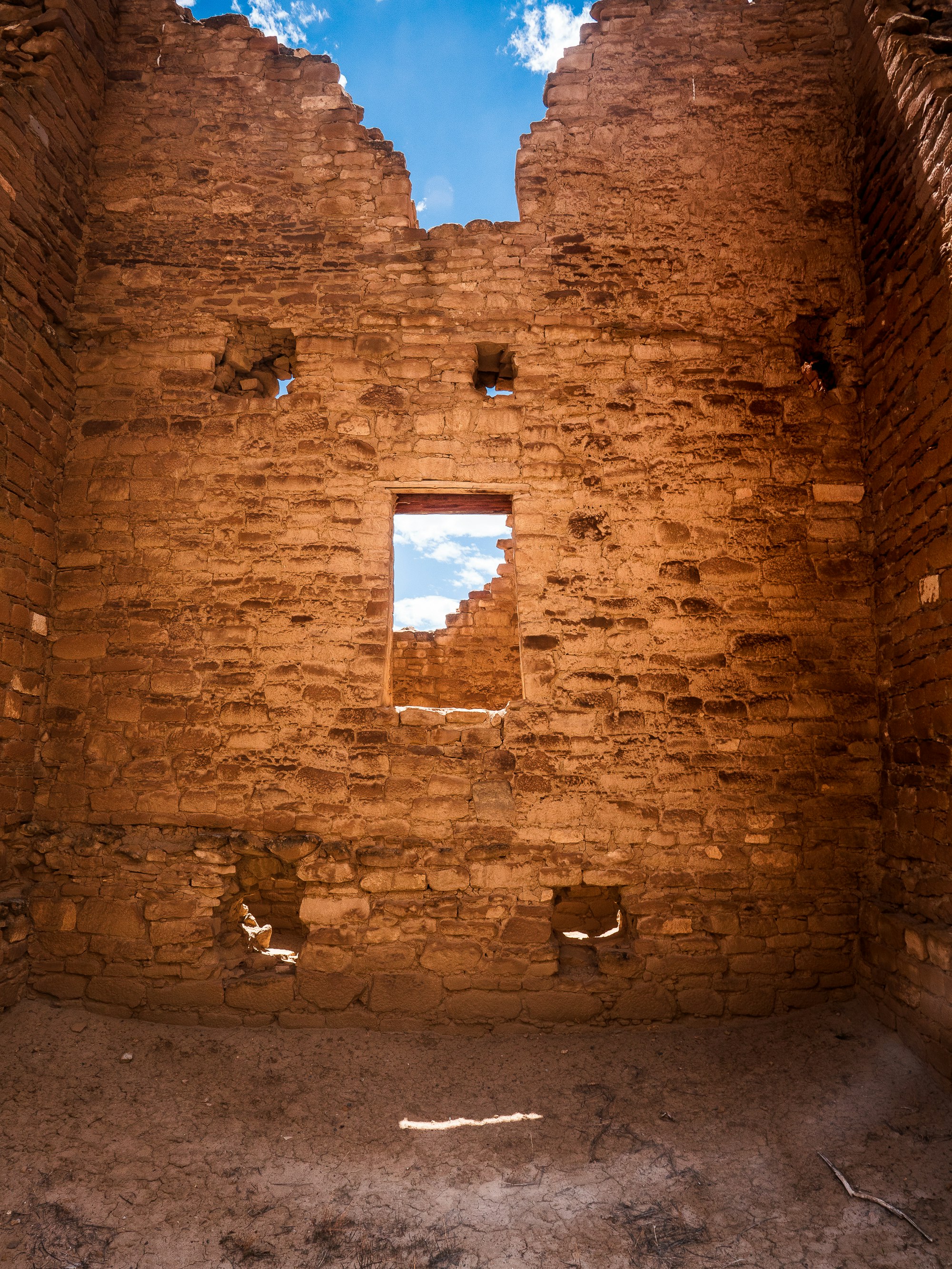 brown brick wall with white square frame